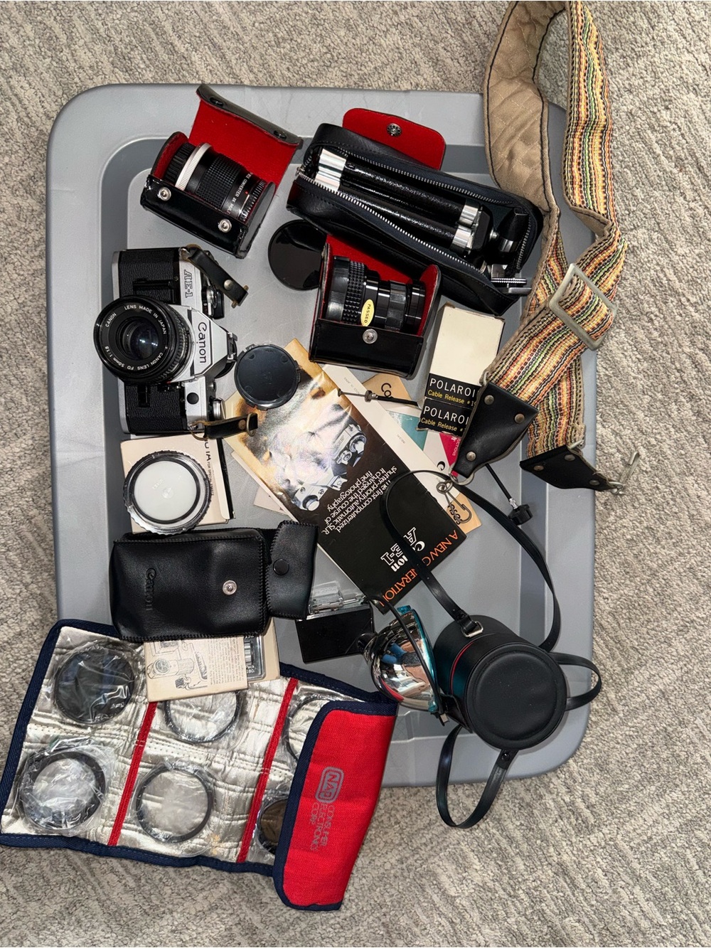 Vintage Canon Camera with lenses, filters, flash, tripod and other accessories.